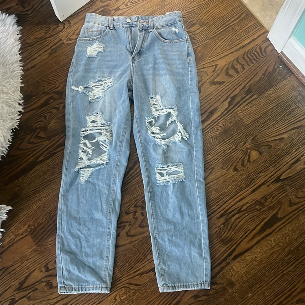 blue faded ripped mom jeans